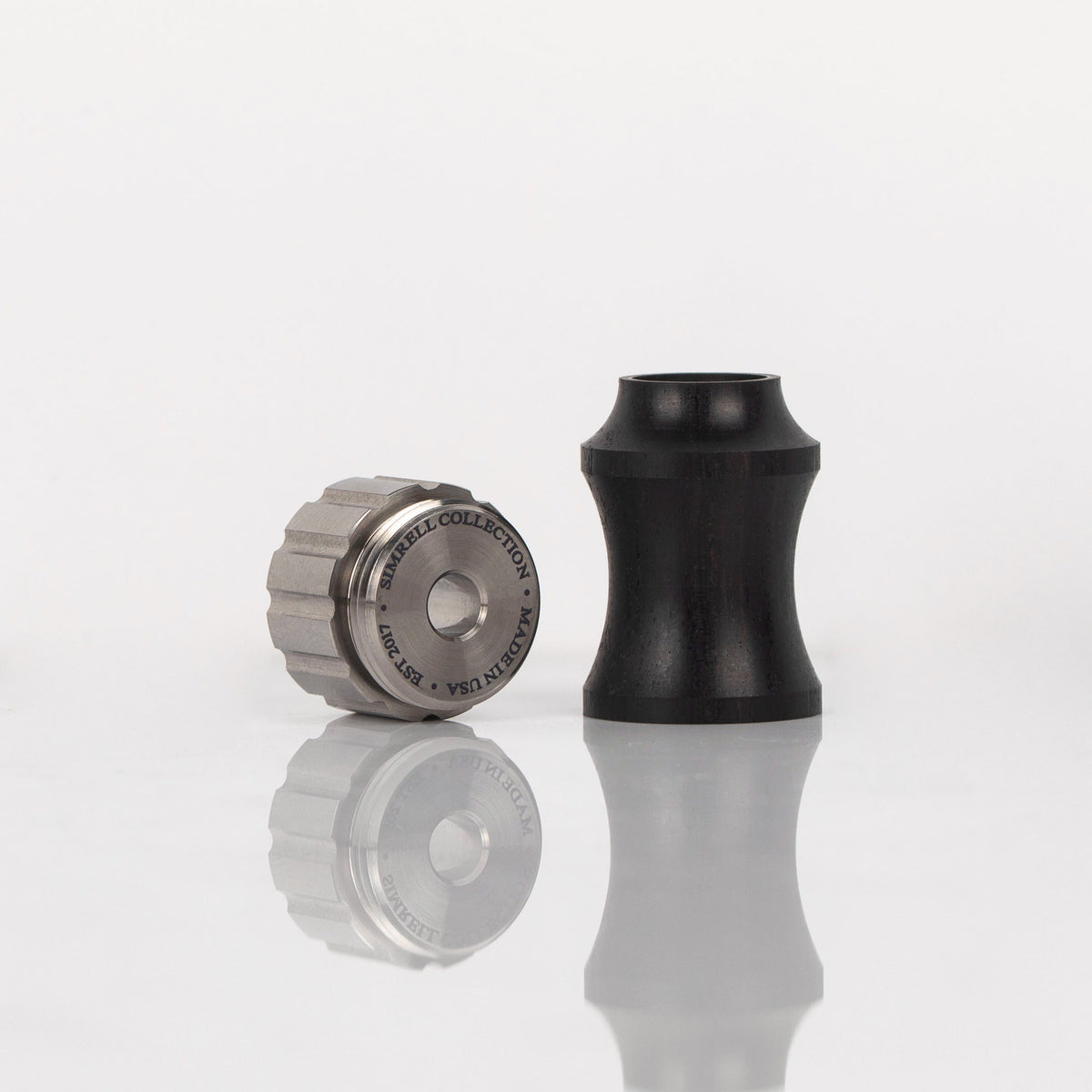 Titanium XL Stem Adapter beside the XL Blackwood Sleeve