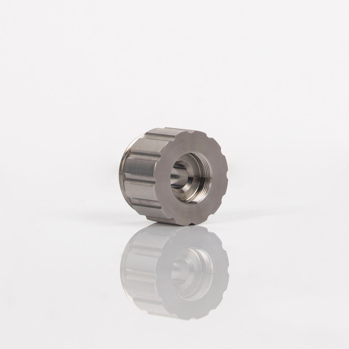End view of the titanium XL Stem Adapter showing its grip flats